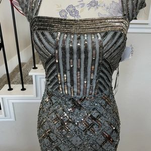 Long evening gown with beads and sequins.